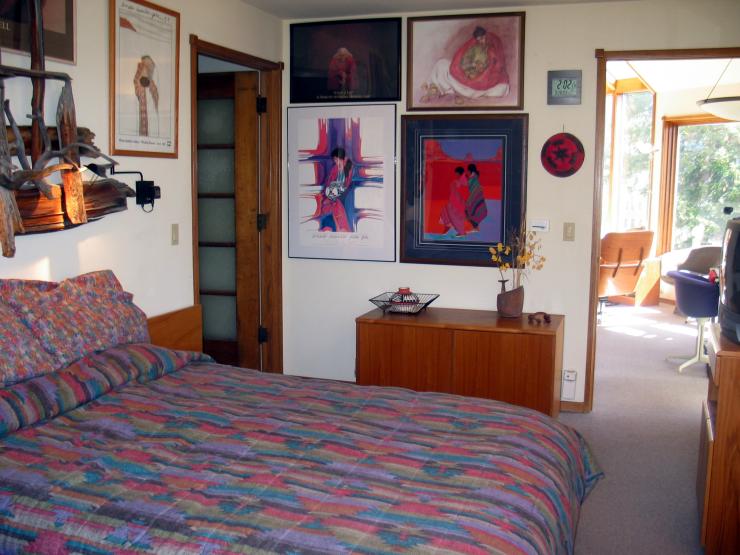 The queen sized bed and private bath with Jacuzzi makes for the perfect master bedroom