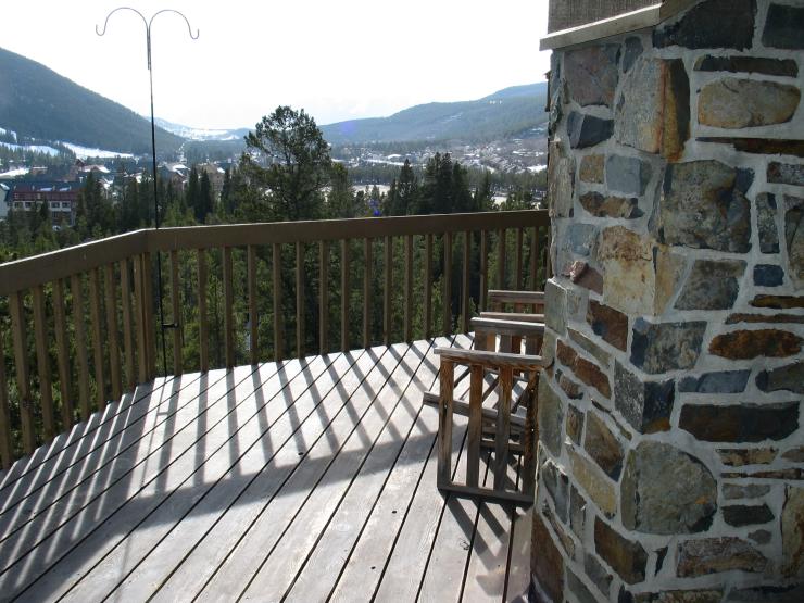 The large deck is a perfect place to unwind after a long day, watching the sun set over the beautiful Rocky Mountains